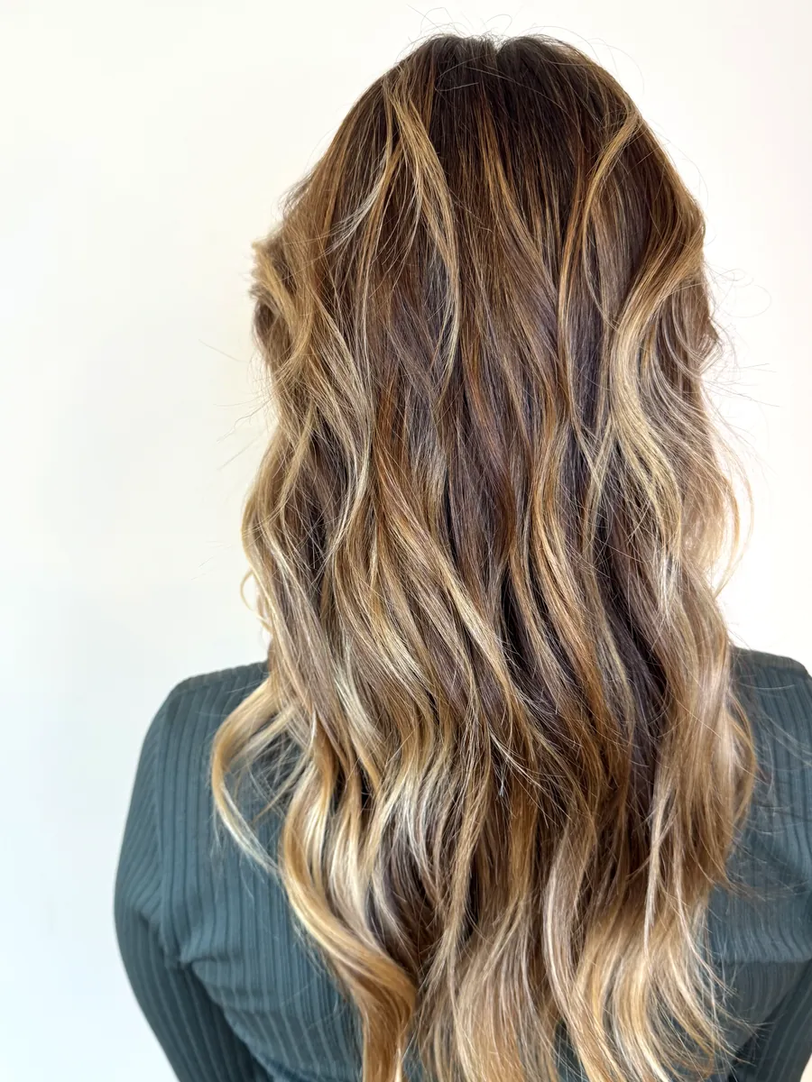 Hair after — bright, blended, dimensional highlights